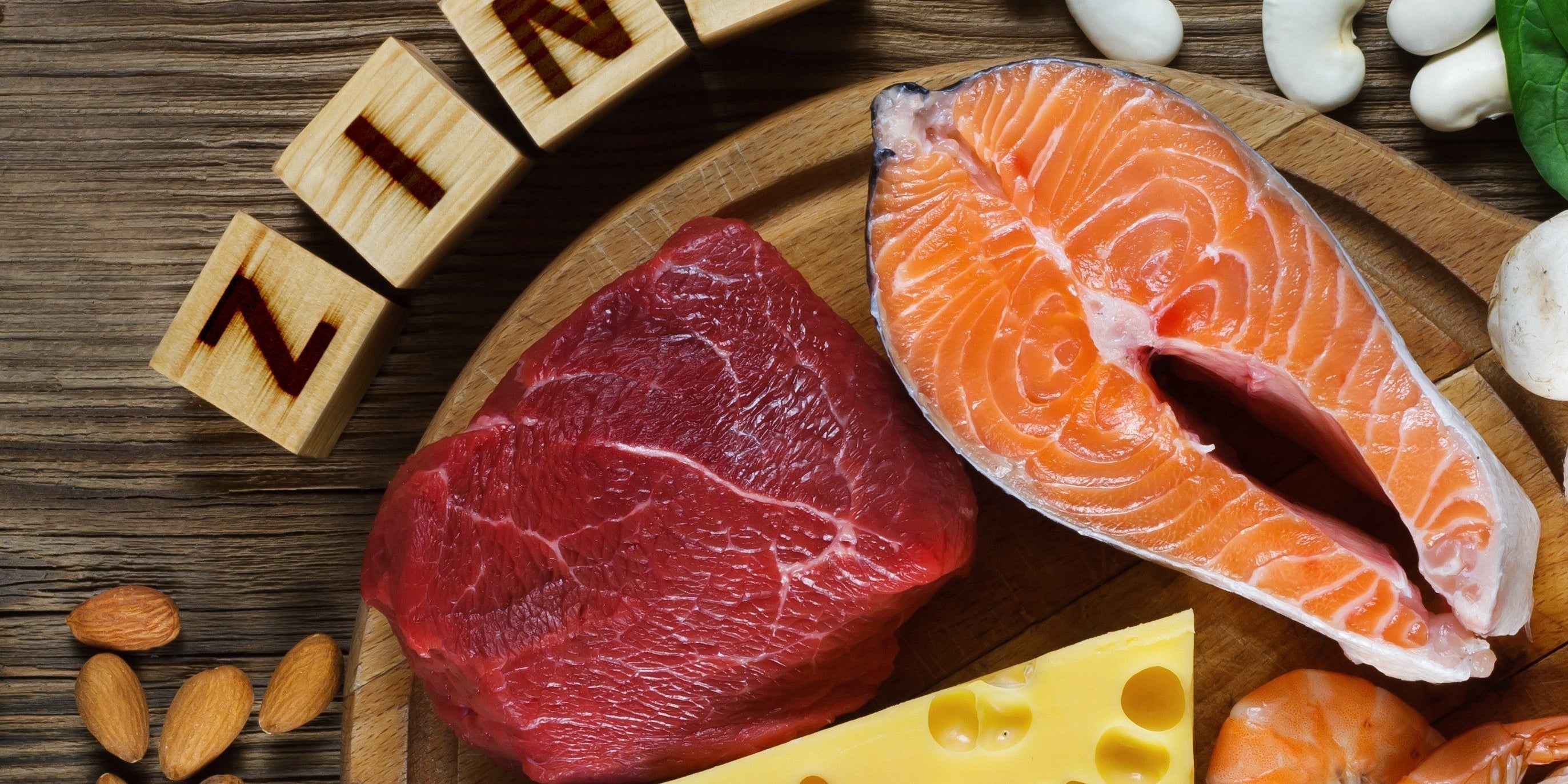 Foods rich in zinc for survivors, including fish, cheese, and beans