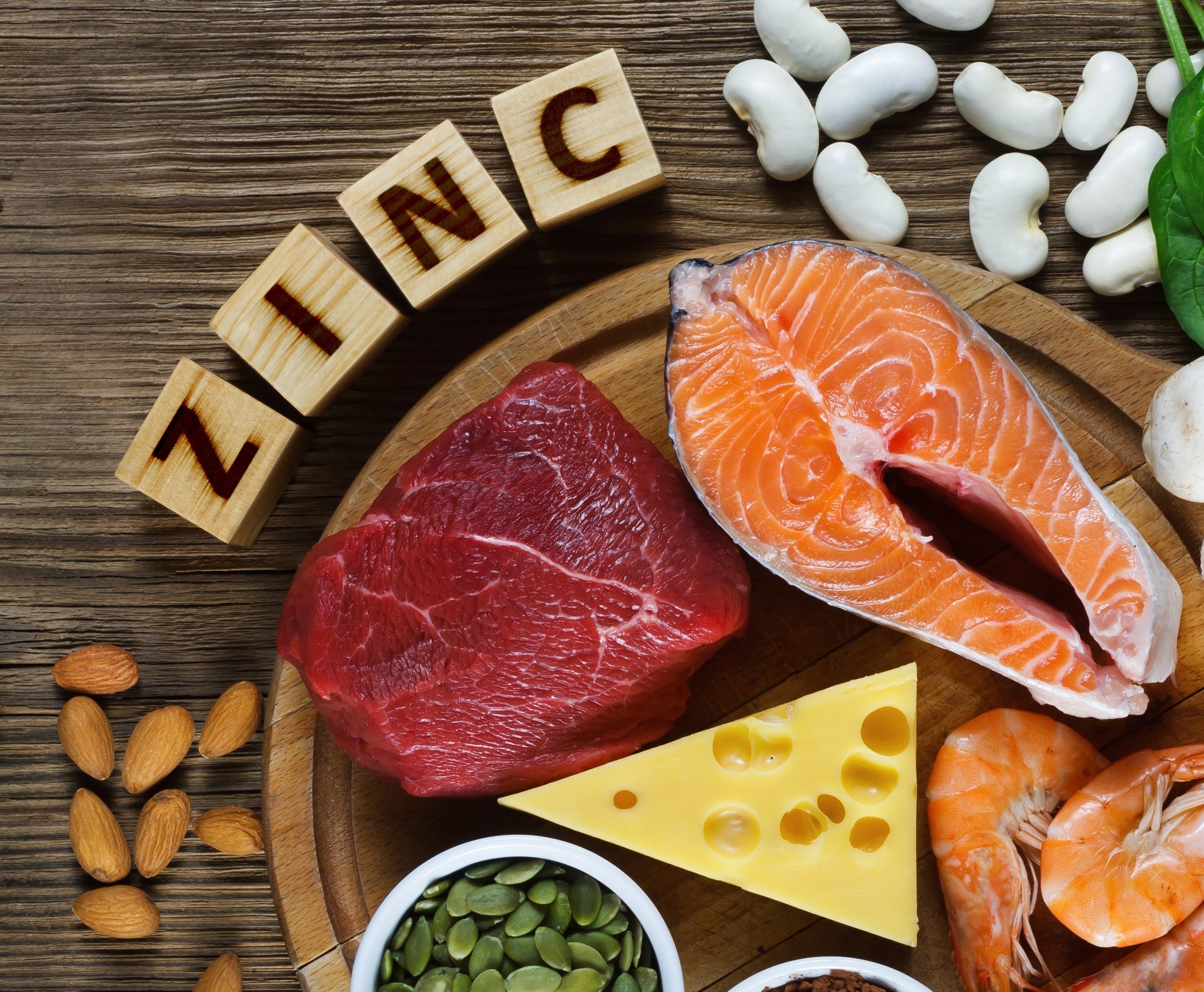Foods rich in zinc for survivors, including fish, cheese, and beans